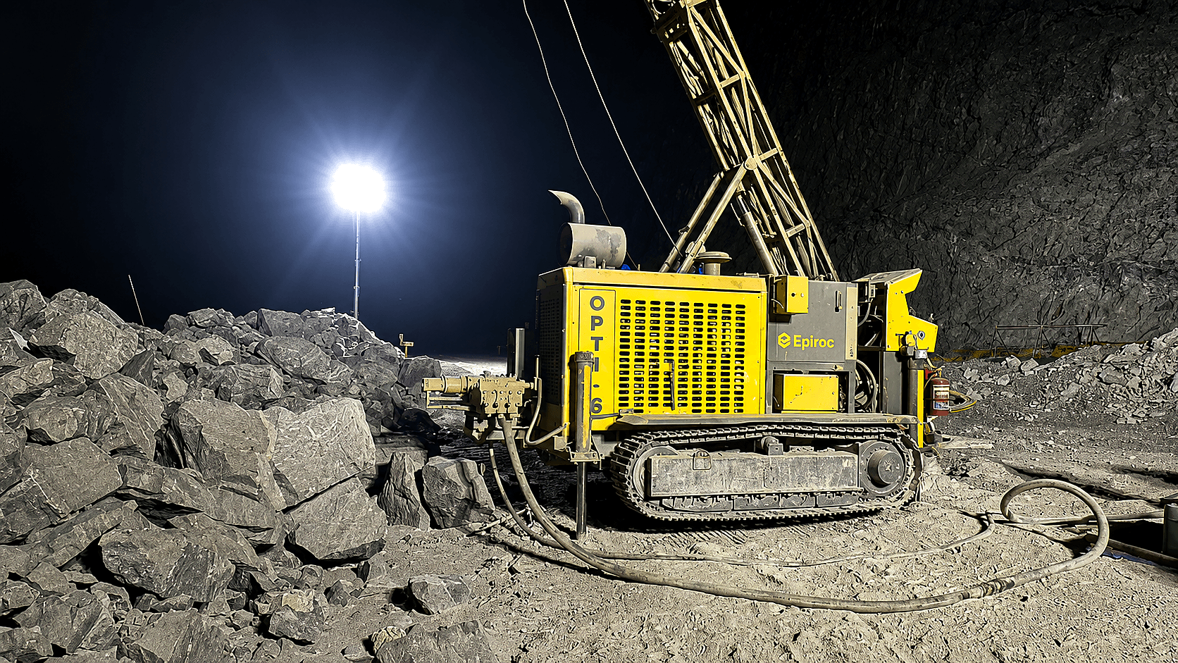 Optimine drilling rig at site